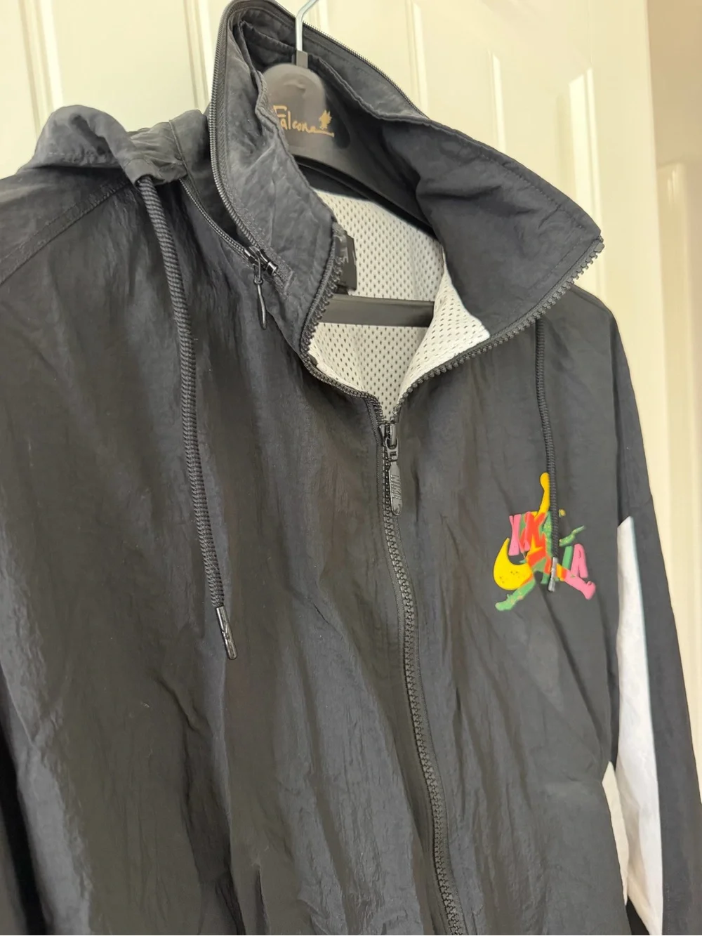 Jordan Black Hooded Windbreaker with Multicolor Logo Accent